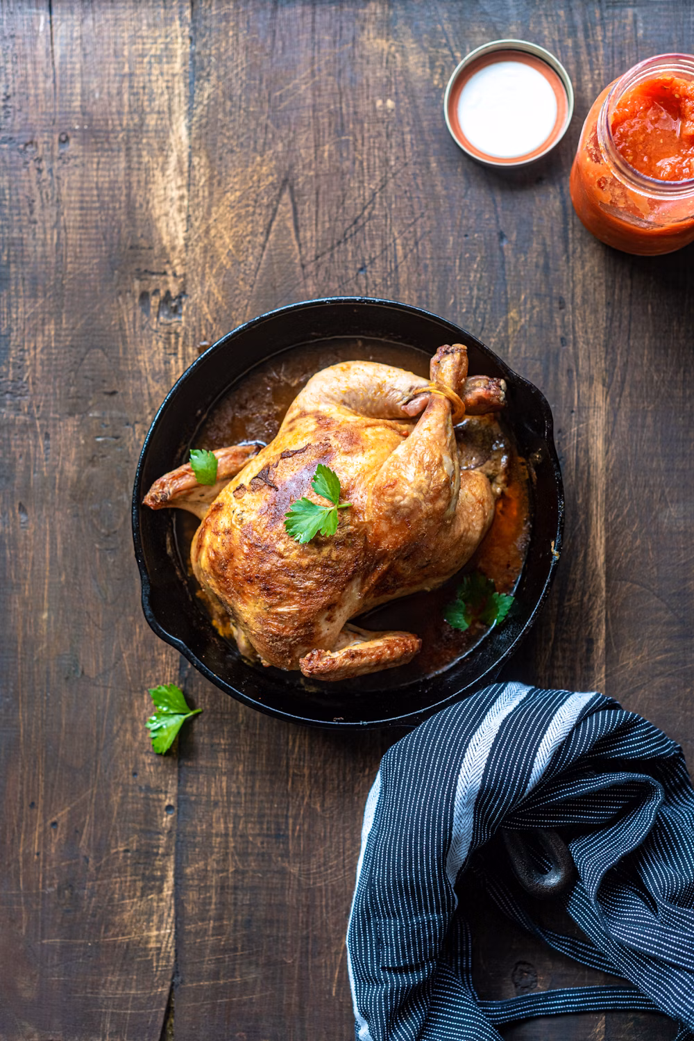 Baked chicken topped with mint leaf
